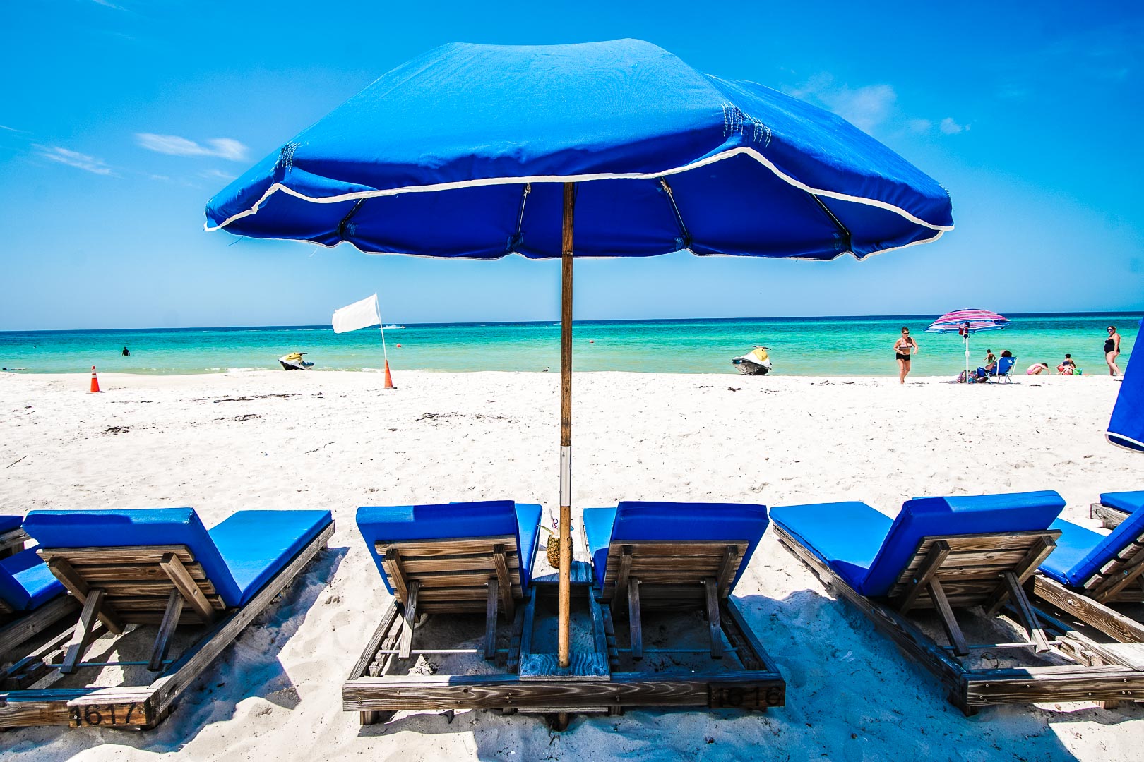 Beach chairs by the beach at VRI's Landmark Holiday Beach Resort in Panama City, Florida.